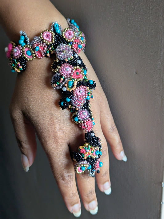 Madhuri 5-in-1 black, pink, blue, gold and ivory seed pearl Indian hand bracelet handcrafted by Mayaani Jewellery UK.