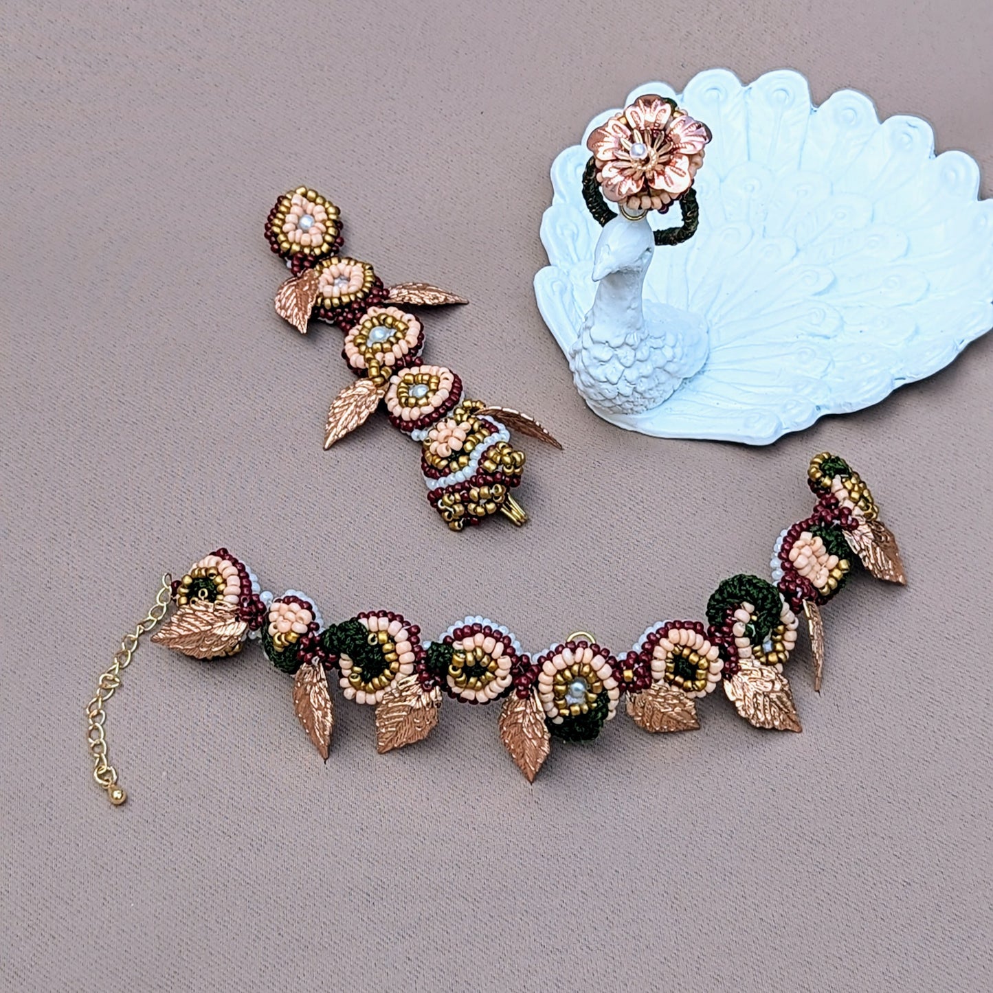 Indian 3-in-1 Mayaani Jewellery Indian hand bracelet displayed against a soft neutral background clearly showing the three separate pieces this unique piece of jewellery can be separated into for wear beyond your wedding day.