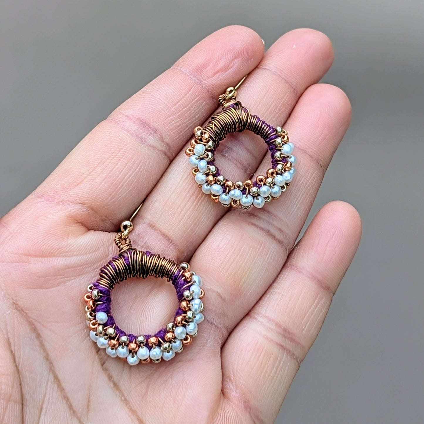 Handcrafted pearl earrings blending Indian heritage with sustainable modern style.