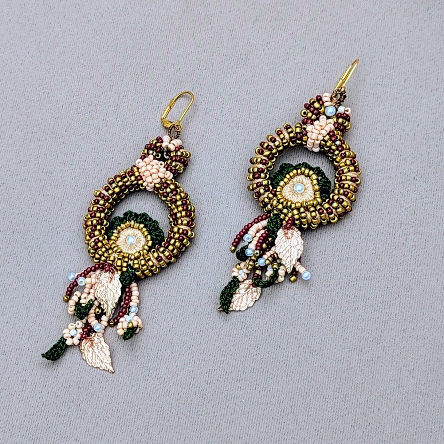 Indian bridal earrings displayed on neutral background, capturing luxurious handcrafted detail.