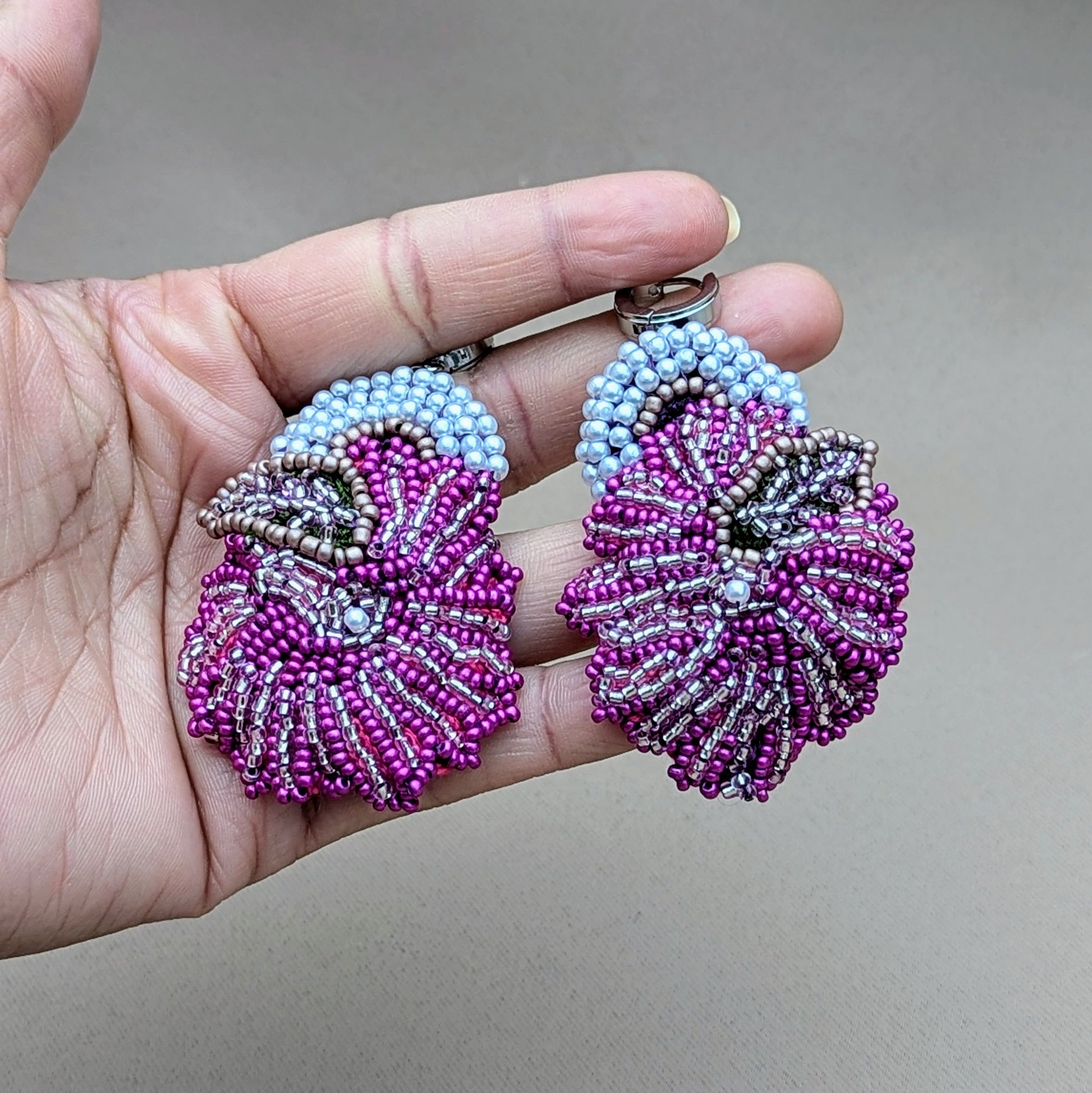 Lila purple, pink and silver beaded statement earrings handmade in the UK.