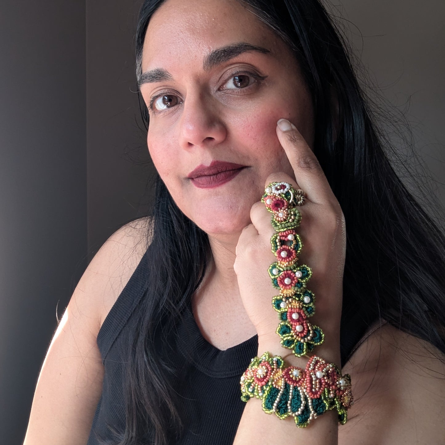 Founder of luxury artisan brand Mayaani Jewellery UK modelling the 5-in-1 Rukmini handmade Indian haath phool - conscious luxury jewellery.