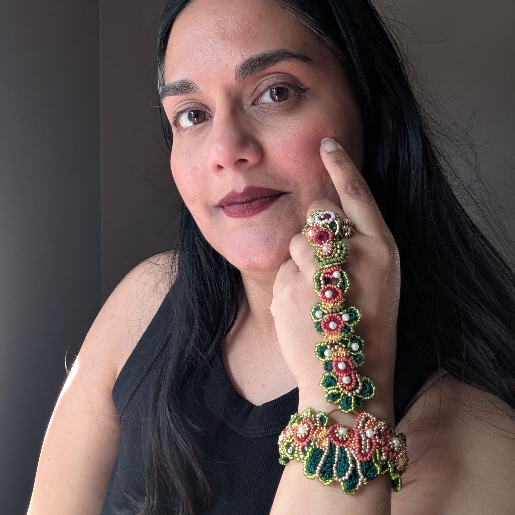 Founder of luxury artisan brand Mayaani Jewellery UK modelling the 5-in-1 Rukmini handmade Indian haath phool - conscious luxury jewellery.