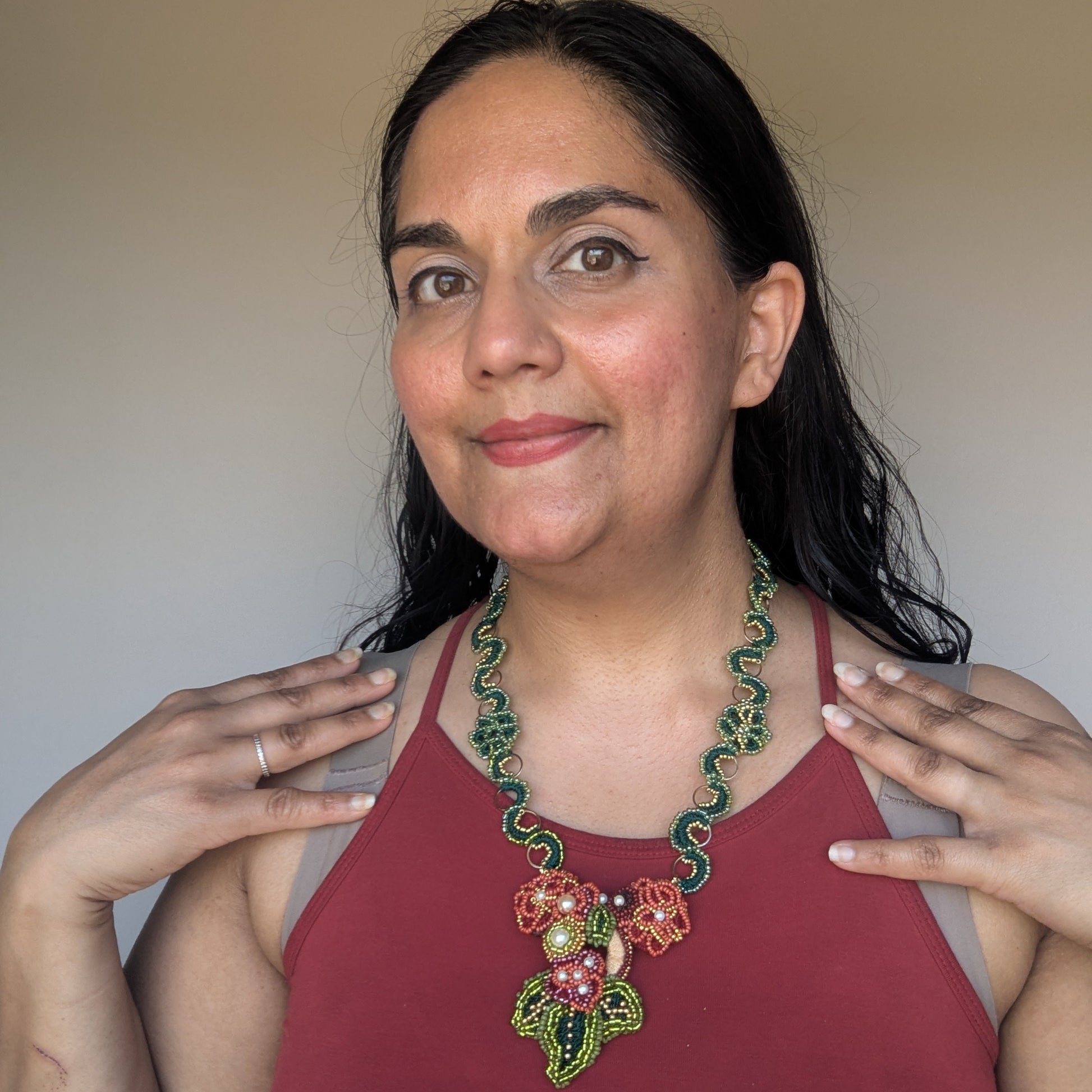 The second look of the Rukmini 2-in-1 artisan handcrafted couture necklace by Mayaani Jewellery UK featuring rich burgundy, gold, pearly white, yellow and emerald and olive green tones.