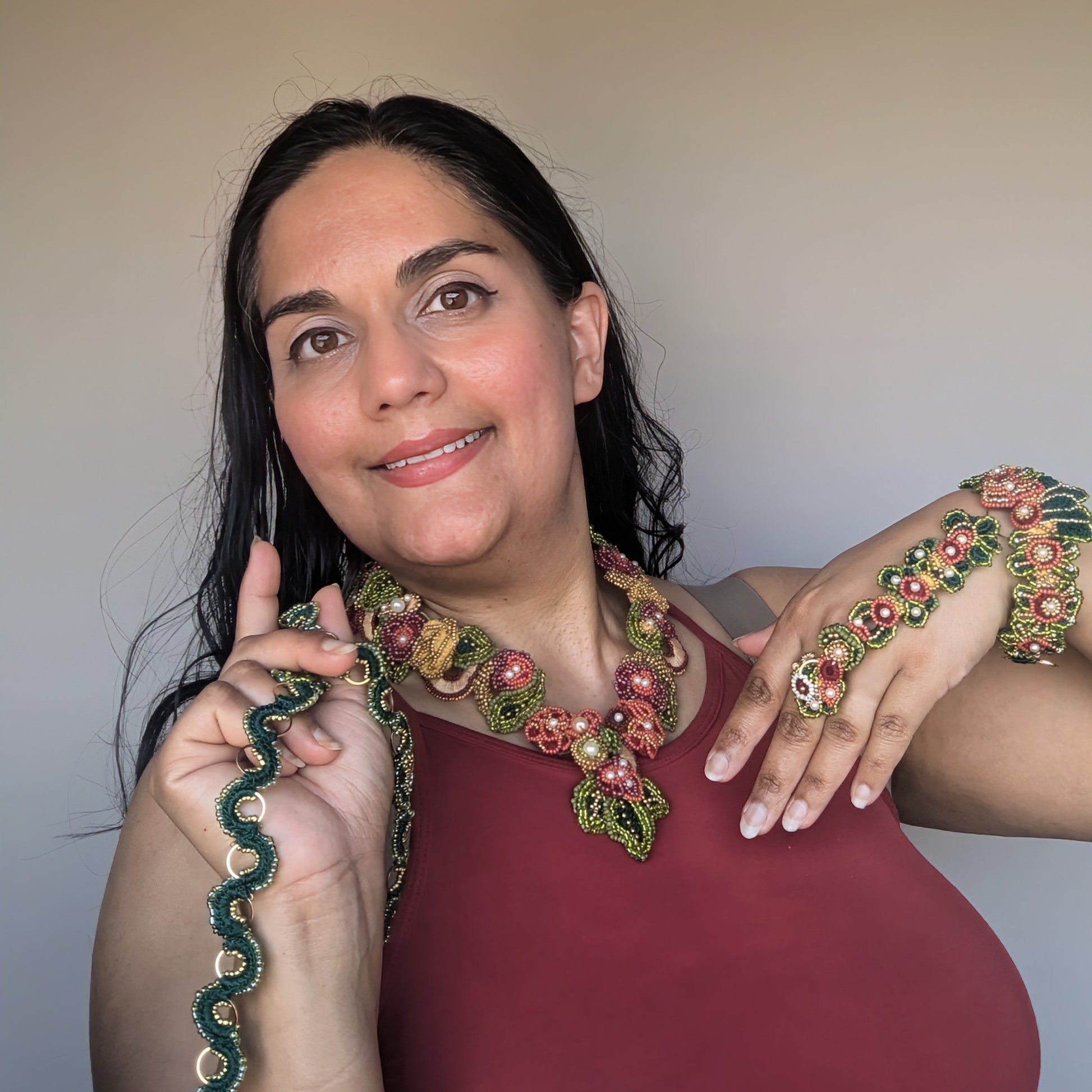  Mayaani Jewellery founder, artisan and designer Megha modelling the complete Rukmini couture Indian bridal set featuring 2-in-1 necklace with custom Rukmini chain available made to order and 5-in-1 hand bracelet in classic heritage colours of red, green and gold with a modern twist.