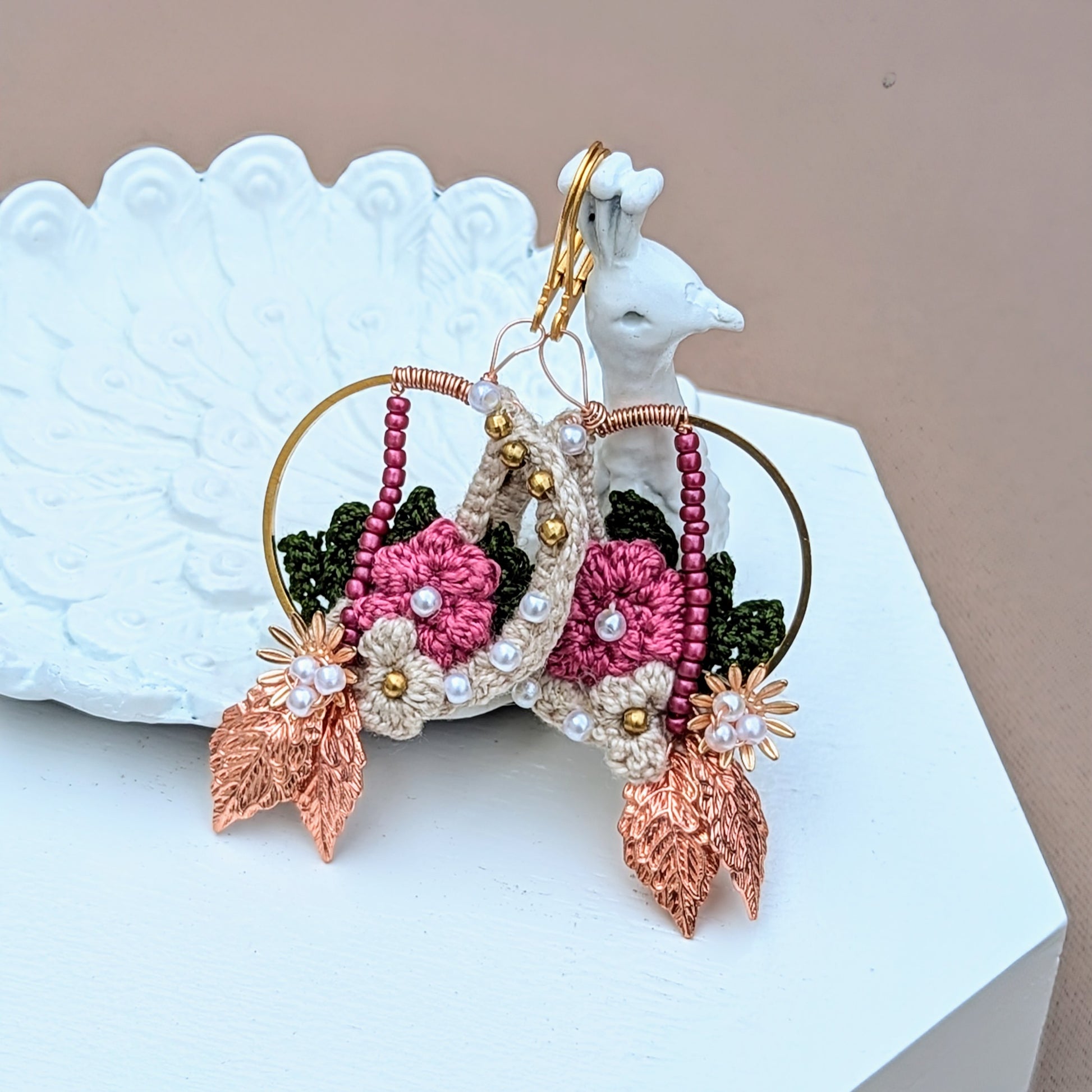 Sustainable luxury beaded hoop earrings with solid brass, seed pearls and rose gold accents. Indian inspired design featuring pink, green, cream and gold artisan made for Mayaani Jewellery UK.