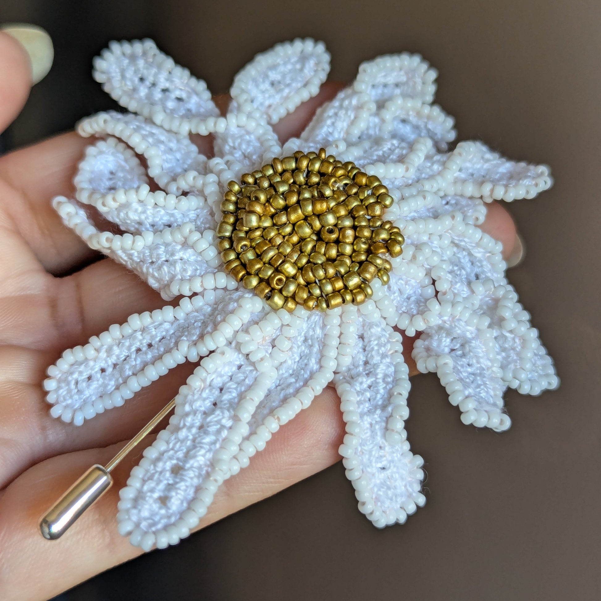 Daisy handmade sculptural floral brooch by Mayaani Jewellery - white Egyptian cotton pearls with gold seed bead centre, Garden of Becoming series.