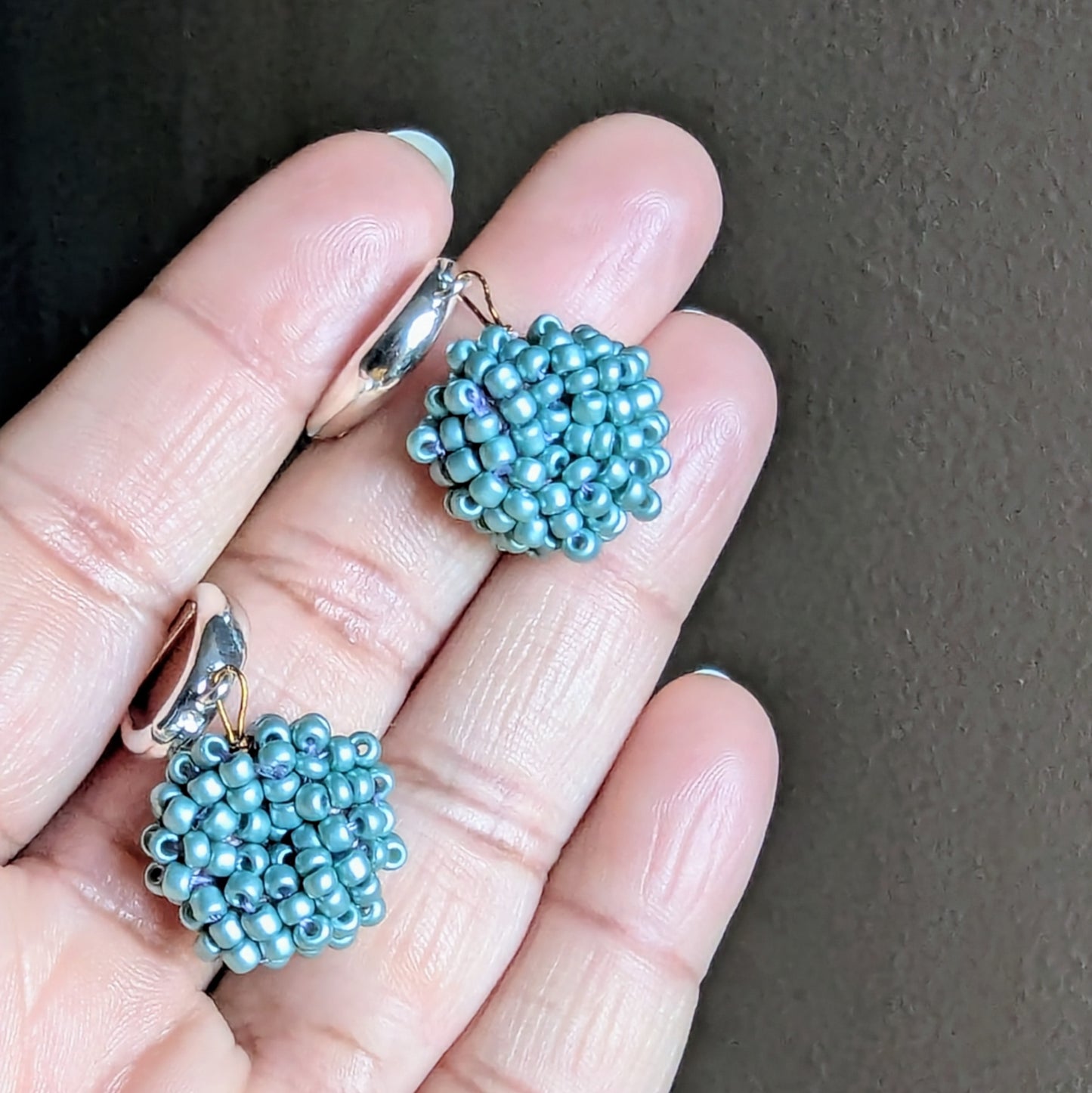 Handmade blue earrings part of the Masi Everyday Edit, showcasing simple elegance and sustainability.