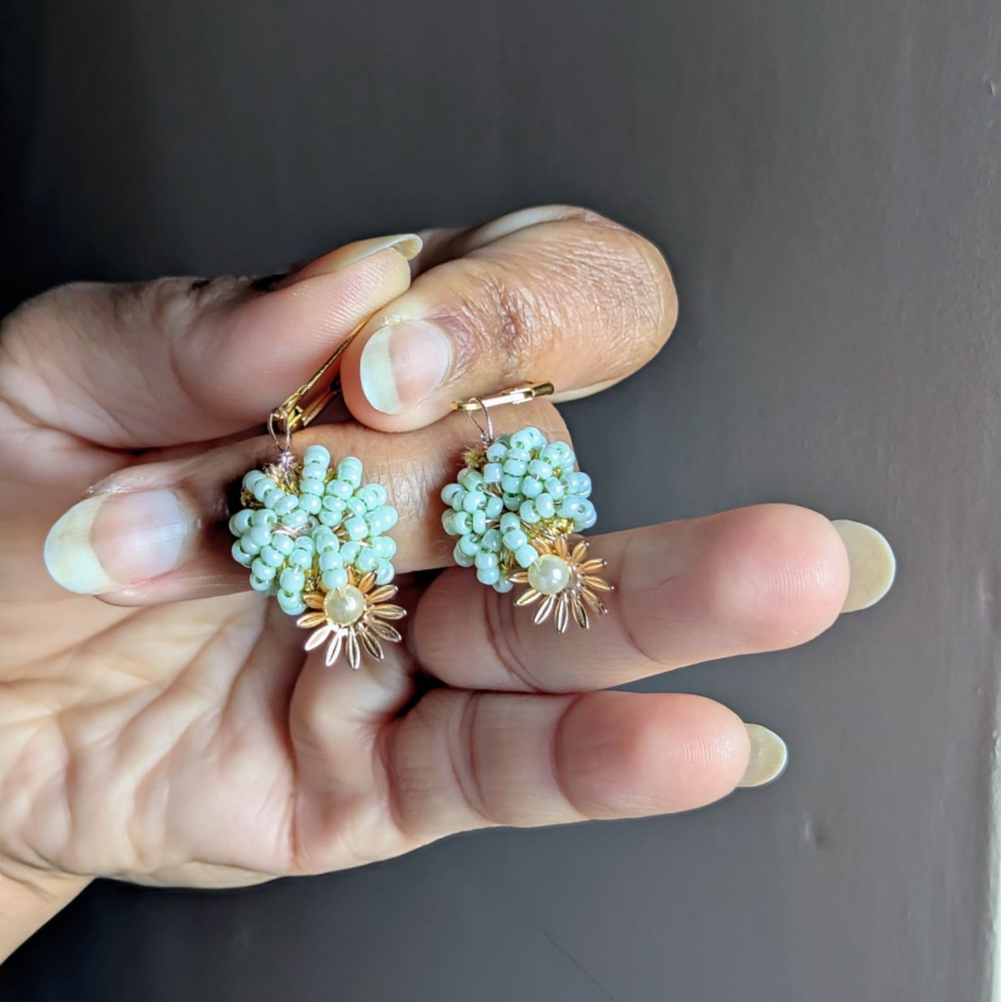 Indian-inspired mint and pearl statement earrings featuring premium beadwork and antique bronze wire, crafted by Mayaani Jewellery.