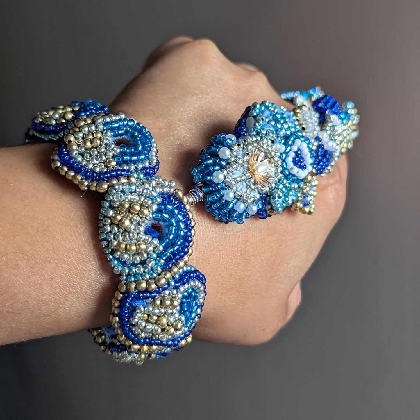Nira 5-in-1 bracelet close up angled view - blue and gold seed bead detail by Mayaani Jewellery UK.