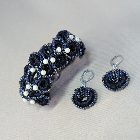 Handcrafted black crochet bracelet and matching beaded earrings set with vintage pearls from Mayaani Jewellery.