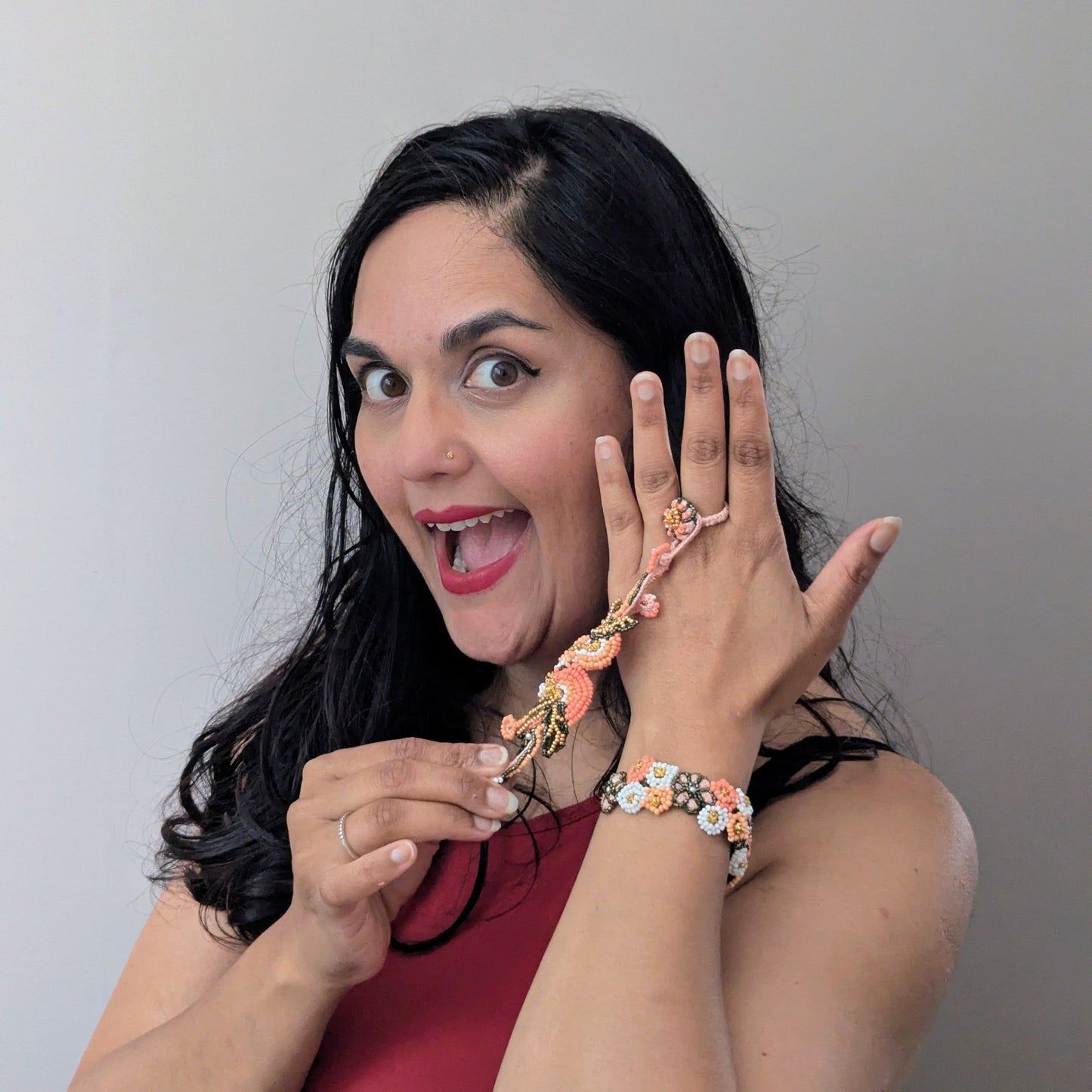 Megha of Mayaani UK wearing the Padmika 5-in-1 innovative concept Indian hand bracelet showcasing the detachable central element. Versatile heritage inspired jewellery for the modern diaspora woman.
