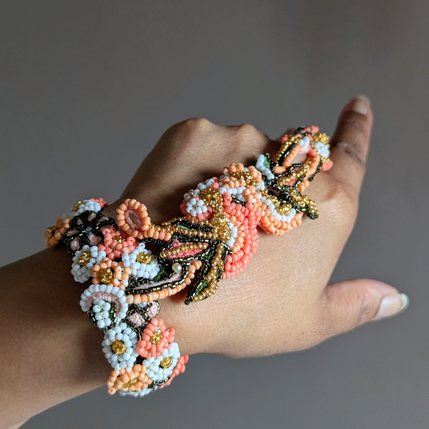 The Mayaani Padmike 5-in-1 innovative concept Indian haath phool bracelet which separates into a Western style wrist bracelet, statement cocktail ring and central element converted into a necklace with the addition of a custom chain.