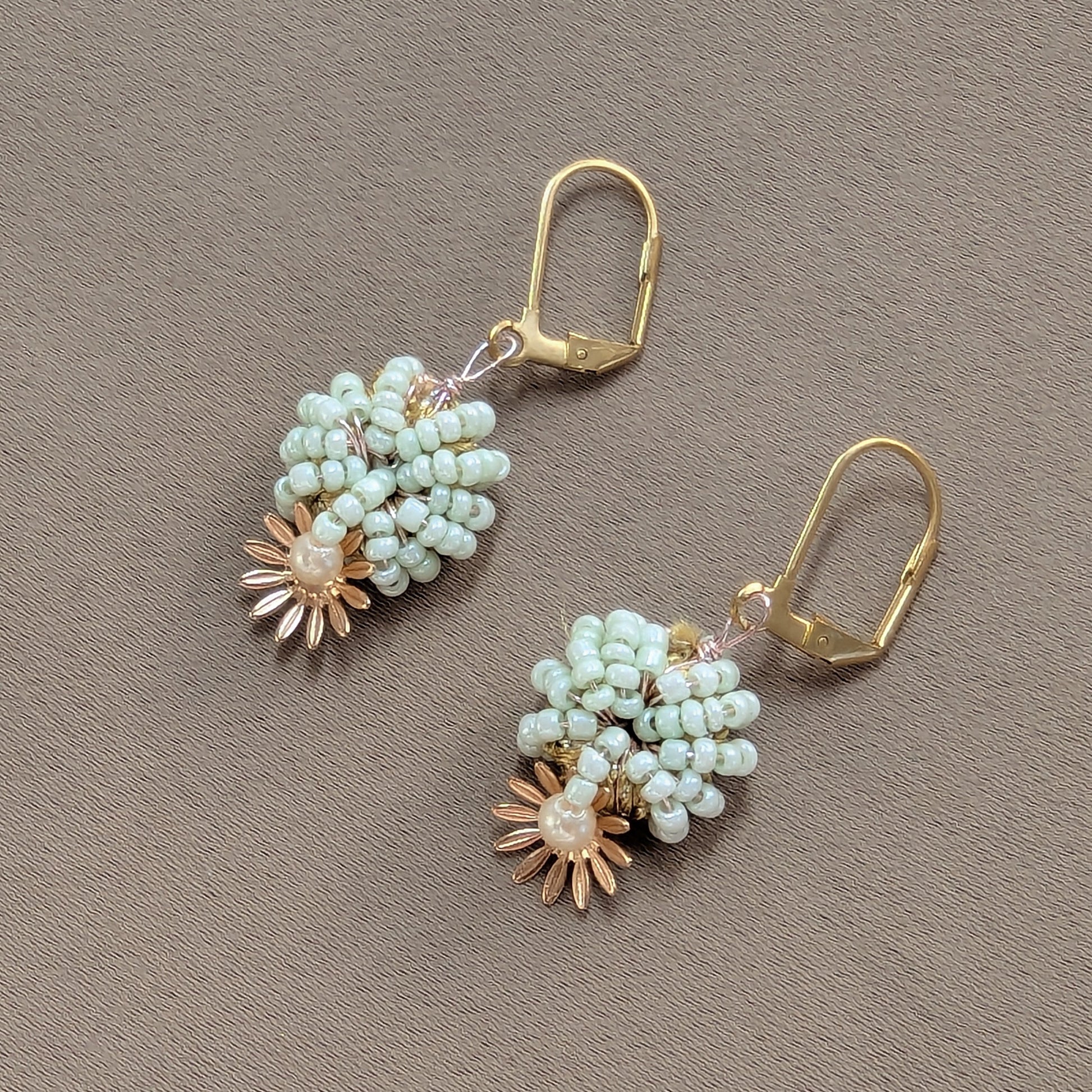 Pair of artisan handcrafted mint green, gold and vintage seed pearl Indian designer earrings perfect for everyday.