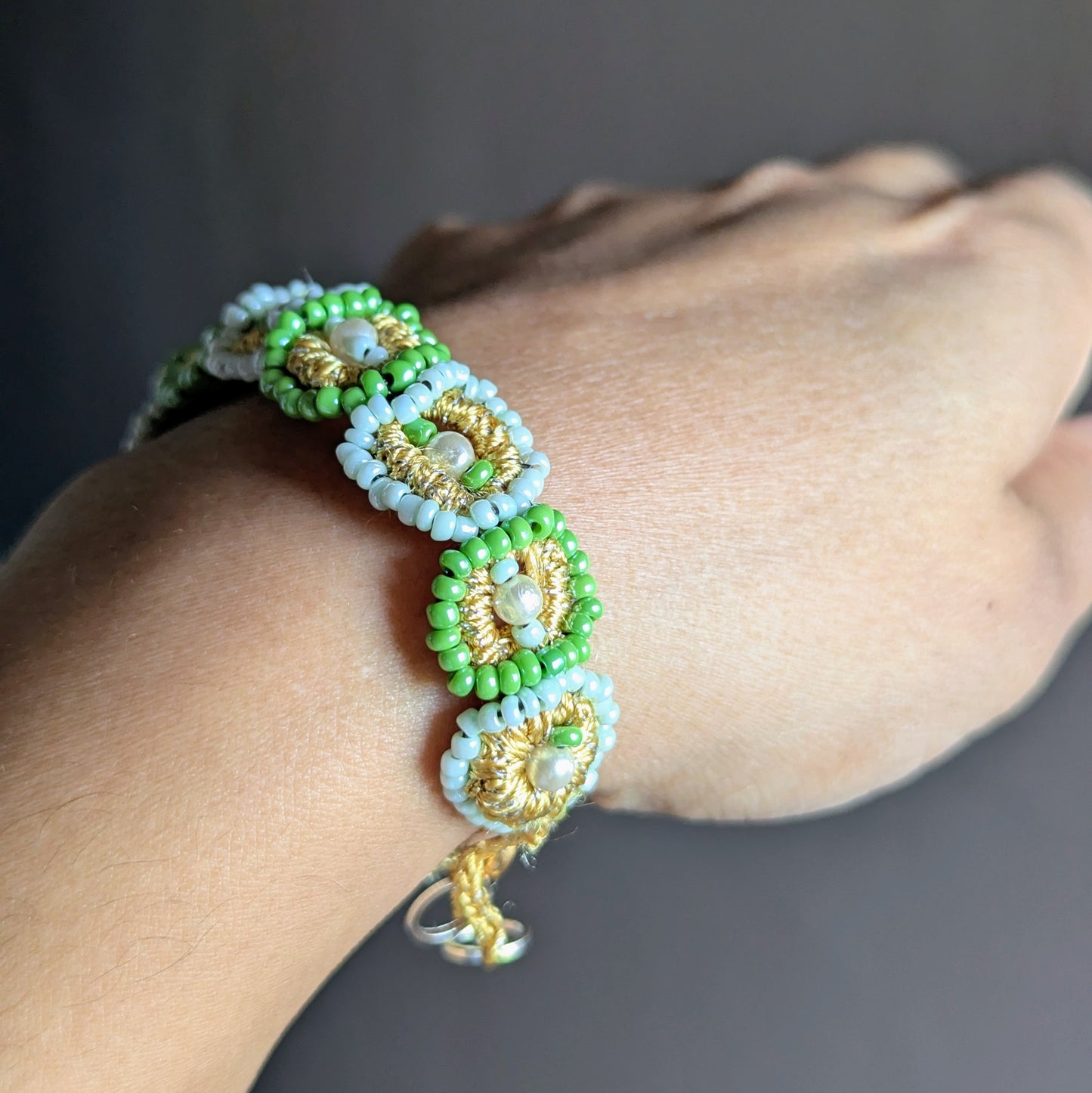 Pranaya green and pearl beaded bracelet handcrafted with Czech beads and vintage pearls by Mayaani Jewellery UK.