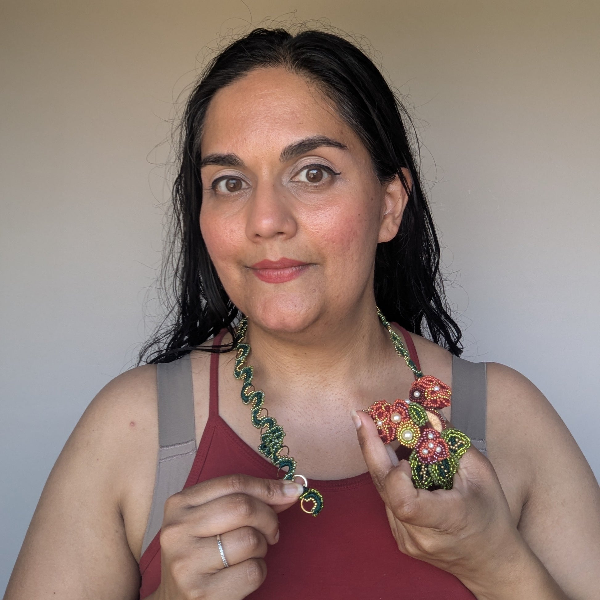 Megha demonstrating the luxurious Indian inspired Rukmini detachable front-facing pendant clasp handcrafted exclusively at Mayaani Jewellery UK.