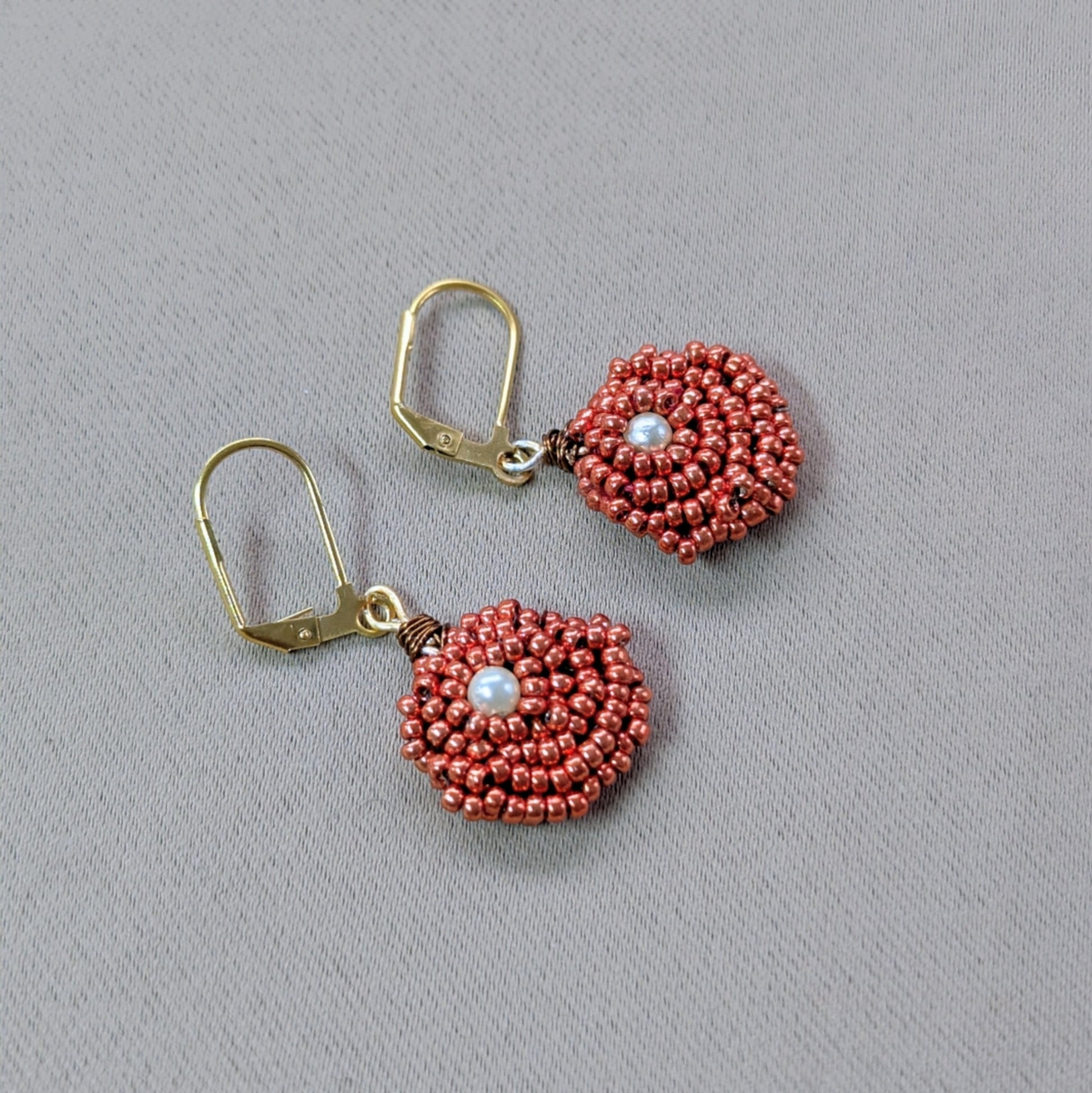 Copper and pearl handmade luxury seed bead earrings in celebration of Indian heritage.