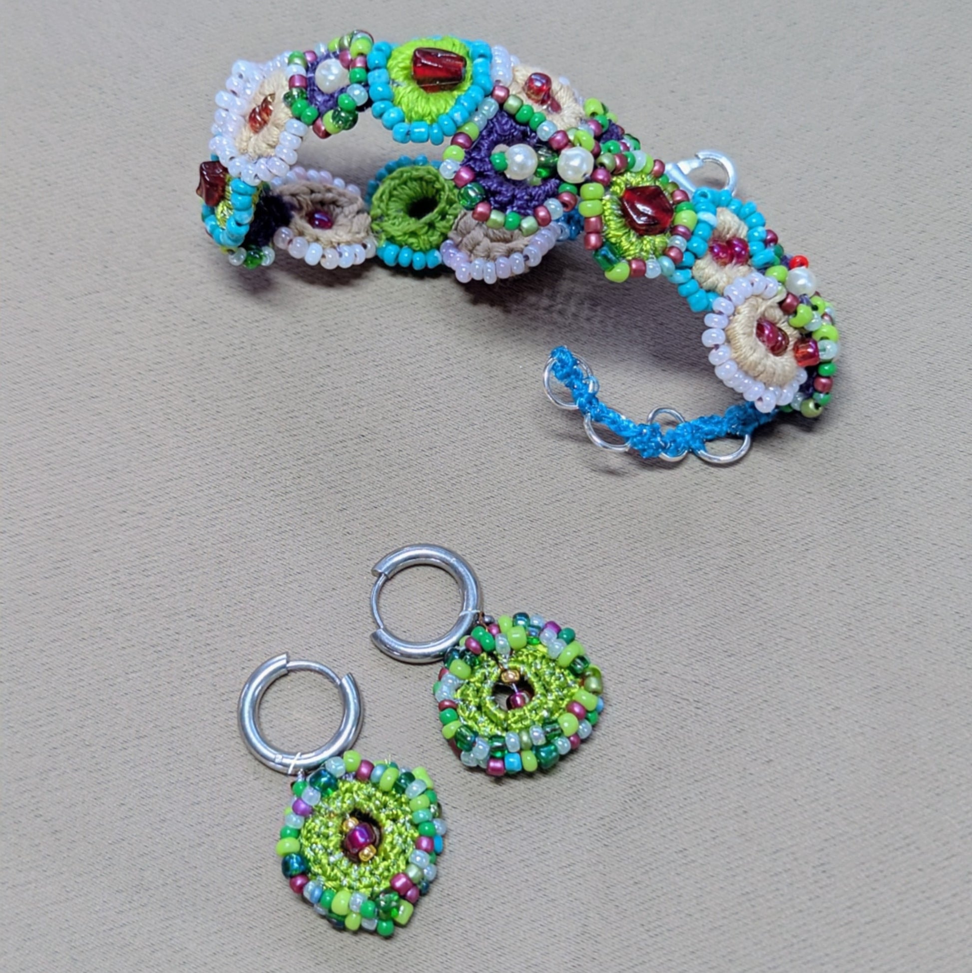 Handmade Vana bracelet and earrings set, handcrafted bead crochet jewellery inspired by a blooming garden.