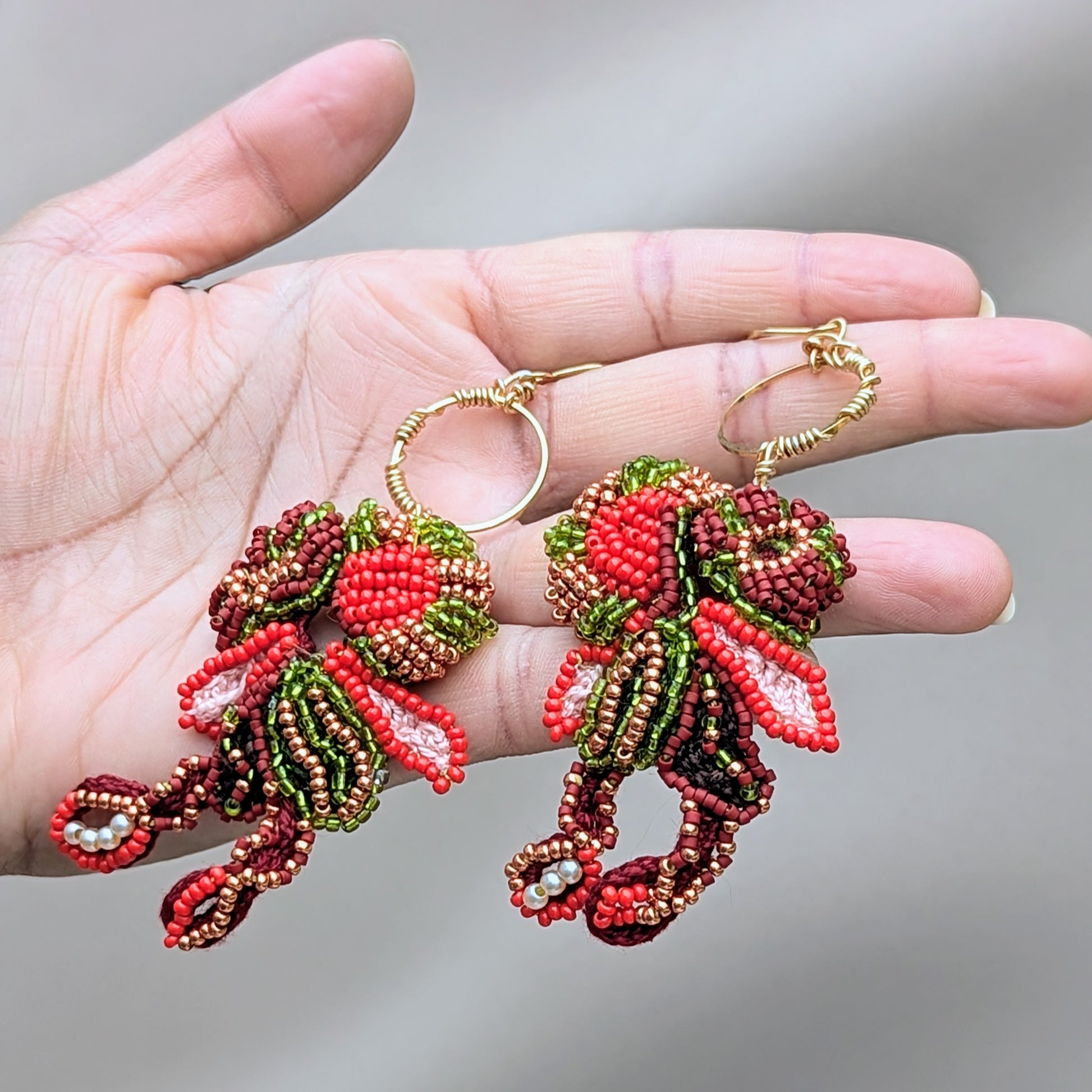 One-of-a-kind Tamira designer Indian statement earrings showing detailed beadwork, movement and sculptural form.