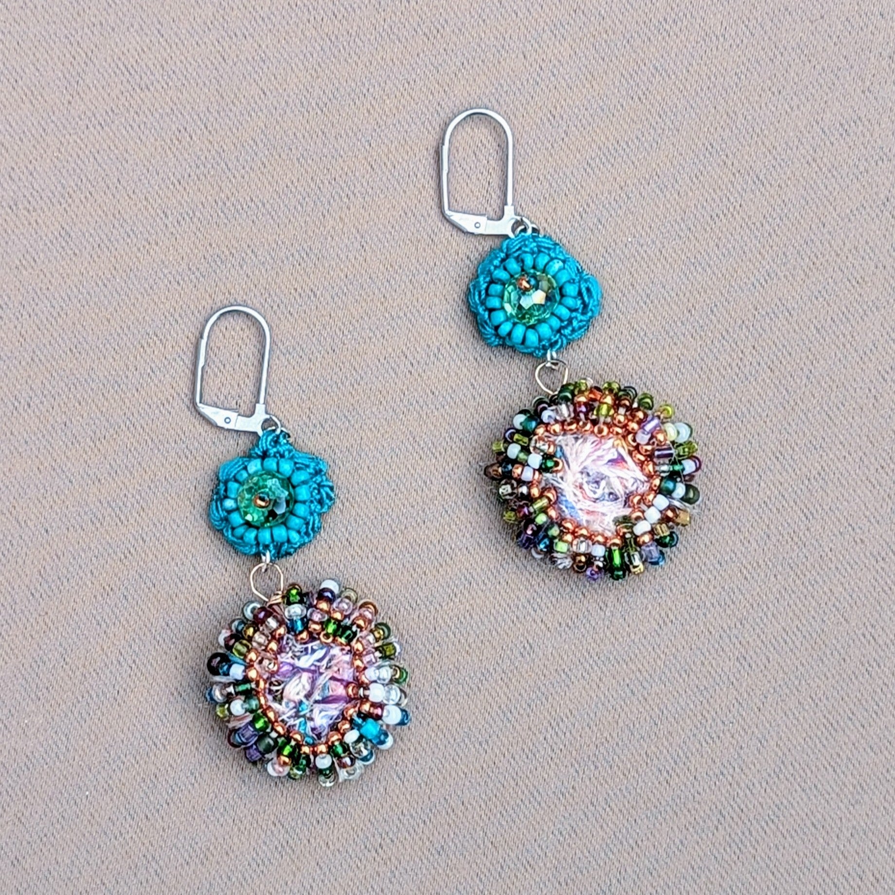 A sustainably handcrafted pair of turquoise scrap bead earrings exclusive to Mayaani Jewellery UK featuring the brand's signature concept scrap beads created to repurpose jewellery making scraps. A beautiful blend of upcycled seed beads perfect for the modern muse.